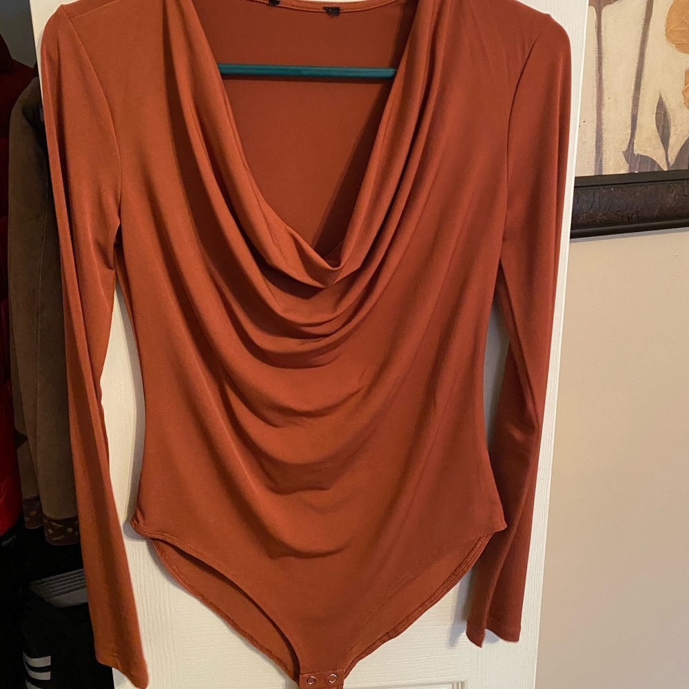 Burnt orange body suit